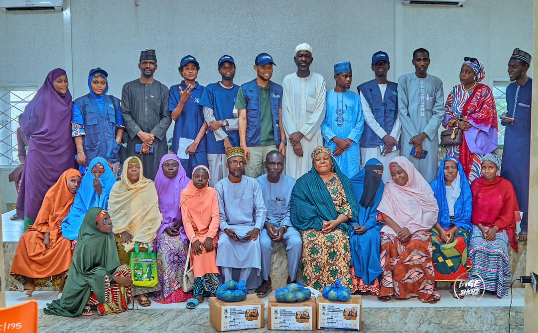 Diverse Nigerian community members in cancer awareness and support event, united in hope and compassion
